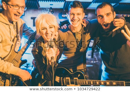 Rock Band On Stage After Successful Concert Foto stock © Kzenon