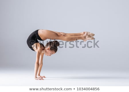 Stock fotó: Beautiful Girl Gymnast Exercising Stretching