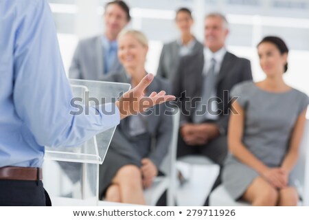 Stock fotó: Stylish Young Businessman Doing A Presentation