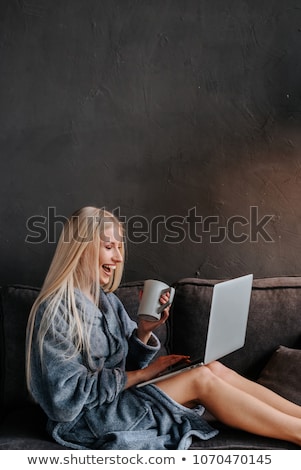 Stock foto: Sexy Blonde Woman Smiling At Camera On Her Bed