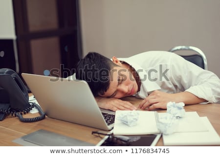 [[stock_photo]]: Businessman Tired And Sleeping In The Office After Overtime Hour