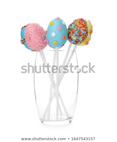 Foto stock: Easter Eggs Of Different Colors And Cakes
