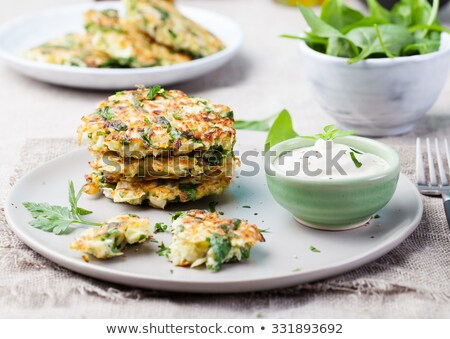 Foto stock: Cabbage And Spinach Pancakes With Yogurt Dressing