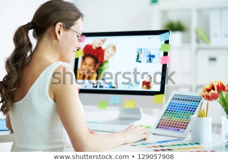 Stockfoto: Female Designer Working On Computer