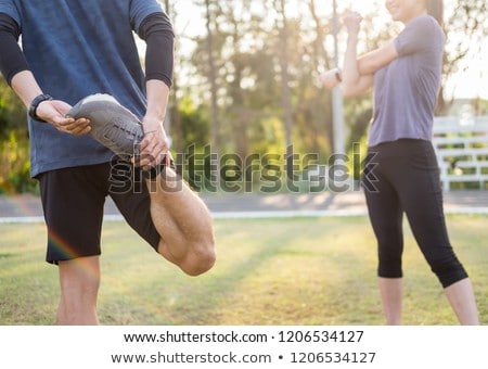 Stock foto: Early Morning Workout Fitness Couple Stretching Outdoors In Par