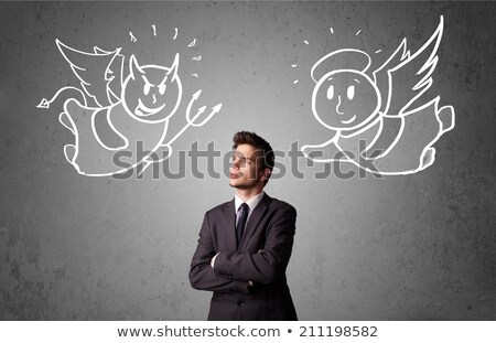 Foto stock: Businessman Standing Between The Good And Bad Conscience