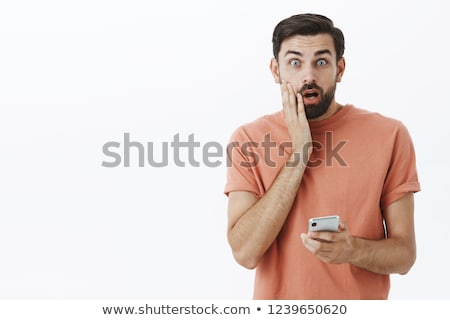 Foto stock: Portrait Of Shocked Businessman With Mouth Open