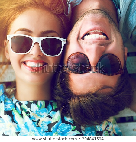 ストックフォト: Portrait Of A Young Couple Having Fun On The Beach