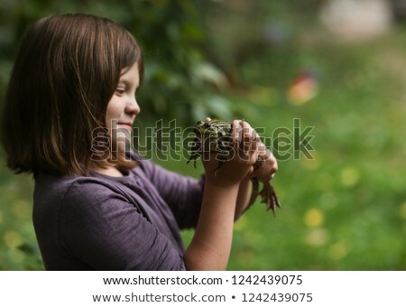 ストックフォト: Girl With A Frog