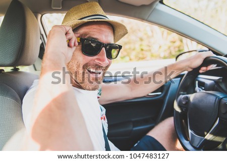 Stock foto: Men Sitting In A Rental Car On Holiday Vacancy