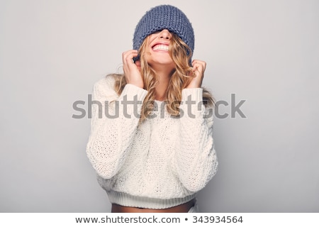 Foto stock: Lovely Young Woman Wearing Sweater And Hat