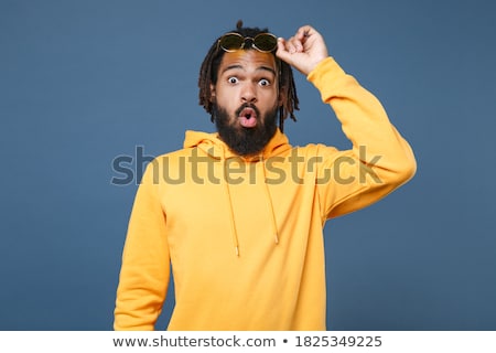 Foto stock: Surprised Man Wearing Black Sunglasses