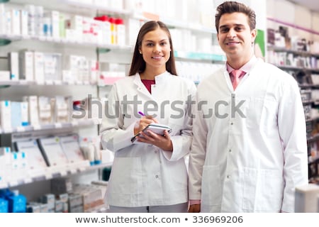 Stok fotoğraf: Indian Male Doctor Or Pharmacist With Pills