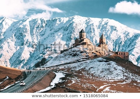 Foto stock: Famous Gergeti Trinity Tsminda Sameba Church In Georgia