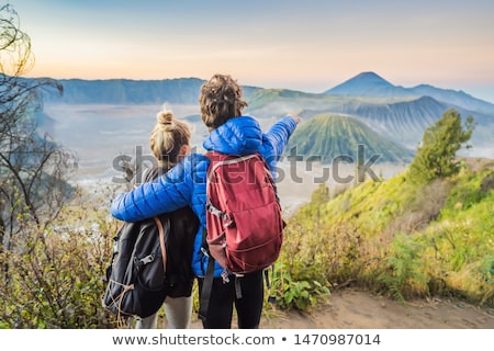 Stock fotó: Young Woman Meets The Sunrise At The Bromo Tengger Semeru National Park On The Java Island Indonesi