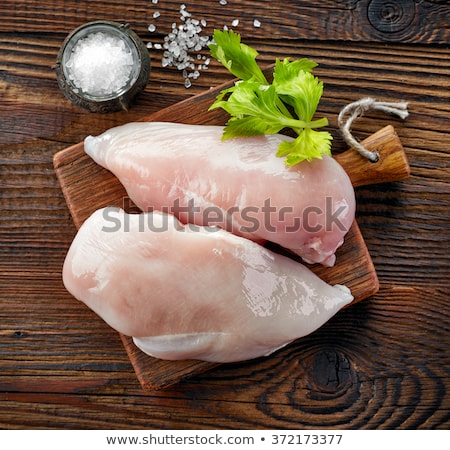 Stock fotó: Raw Chicken Fillet On Cutting Board