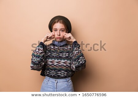 [[stock_photo]]: Photo Of Pretty Unhappy Woman In Earrings Crying And Looking At Camera