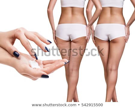 Foto stock: Woman Apply Cellulite Cream On Bottom