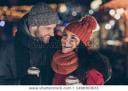 Stock photo: Happy Couple Drinking Hot Beverages On Christmas Market