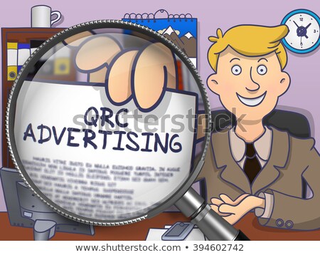 Stockfoto: Qrc Advertising Through Magnifying Glass Doodle Concept