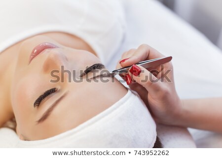 Stockfoto: Beautiful Woman Gets Eyebrow Correction Procedure