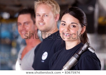 Foto stock: Portrait Of A Young Apprentice With Wrench