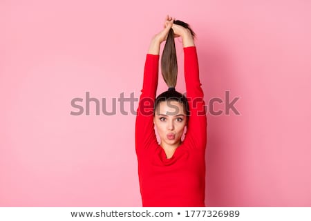 [[stock_photo]]: Girl With Red Tails On A Pink Background A Charming Girl In Bright Sports Clothes Sunglasses And H