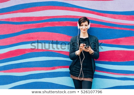 Stock fotó: Blond Woman Listening The Music