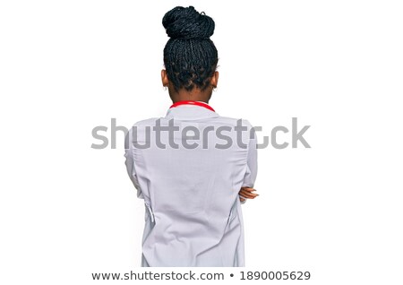 Zdjęcia stock: African Female Nurse Posing Casually In Uniform