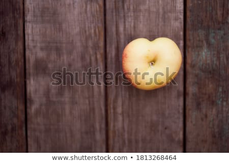 Foto stock: Apple Basket And Bottle Of Cider