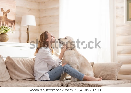 Stock fotó: Happy Smiling Woman In Her White Living Room