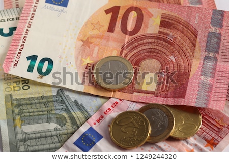 [[stock_photo]]: Euro Banknotes And Coins In Cash Box