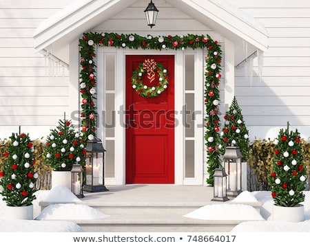 Stockfoto: Christmas Decorations At Front Door Of House