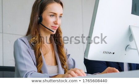 Stockfoto: Business Colleagues With Headsets At Office