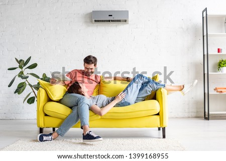 Stockfoto: Couple Resting At Home