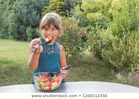 Cute Little Girl Preparing Salad Herself Stock fotó © Frank11