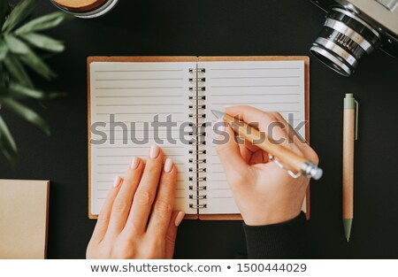 Stock fotó: Camera Next To The Notepad And Pen