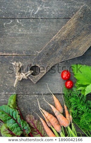 Stok fotoğraf: Chard With Leaves And Beetroots On Soup On Cutting Board