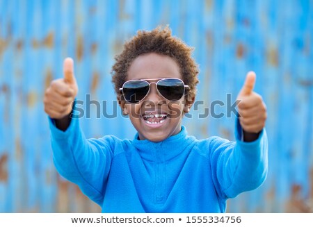 Foto d'archivio: Excited African Kid Saying Ok