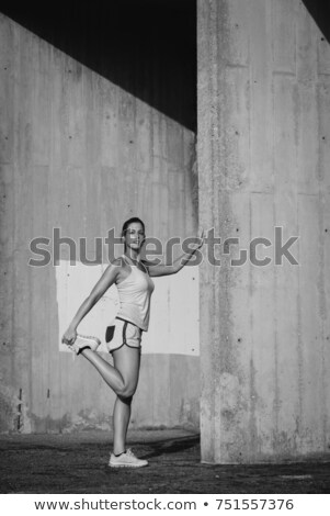 Foto stock: Black Beautiful Sportswoman Stretching And Training At The Beach On Summer Fitness Outdoor Workout