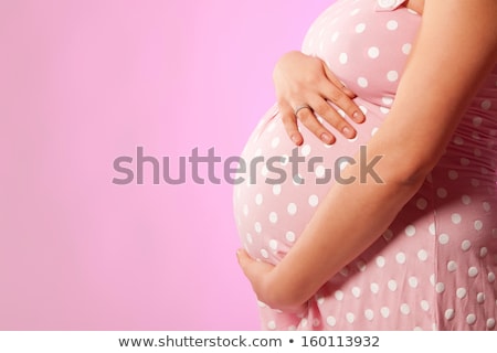 Foto stock: Pregnant Woman Belly Over White Background