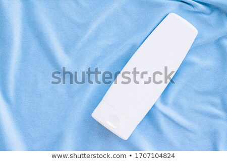 Foto stock: Blank Label Tube Of Hand Cream Or Body Lotion Mockup On Silk Fabric Beauty Product And Skin Care Co