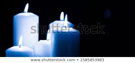 Stock photo: Aromatic Blue Floral Candles Set At Night Christmas New Years