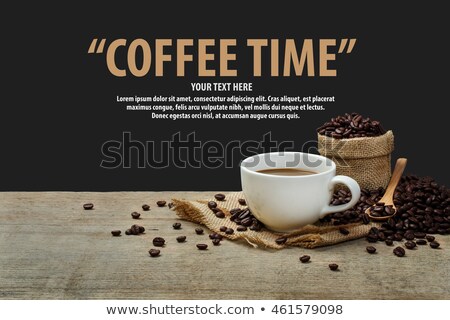 ストックフォト: Hot Fresh Coffee In A White Cup With Spoon On Wooden Table