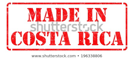 Stockfoto: Made In Costa Rica - Inscription On Red Rubber Stamp