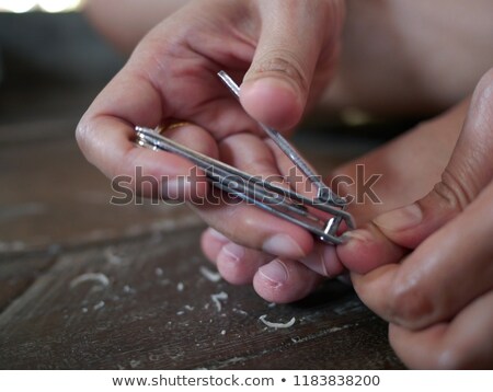 Stok fotoğraf: Crop Woman Cutting Toenails