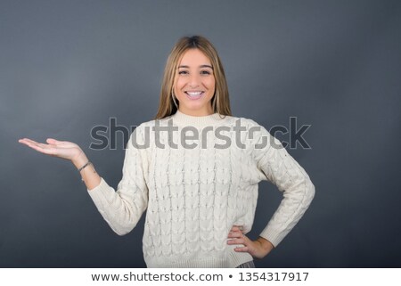 Stock photo: Overjoyed Pretty Amazed Female Model Expresses Positiveness Has Happy Expression Gestures Actively