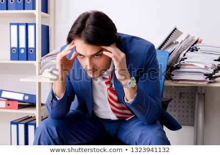 Stockfoto: Workaholic Businessman With Headache And Stress