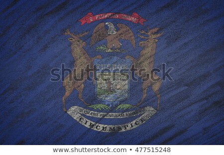 Foto d'archivio: Flag Of Us State Of Michigan On Blackboard Painted With Chalk