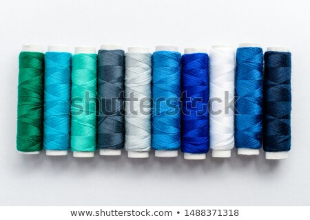 Imagine de stoc: Colorful Thread Bobbins Isolated On White Background